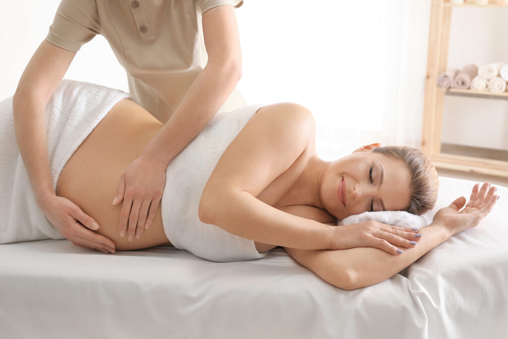Relaxing prenatal massage helping reduce stress and tension during pregnancy at Premier Wellness North Shore, Auckland